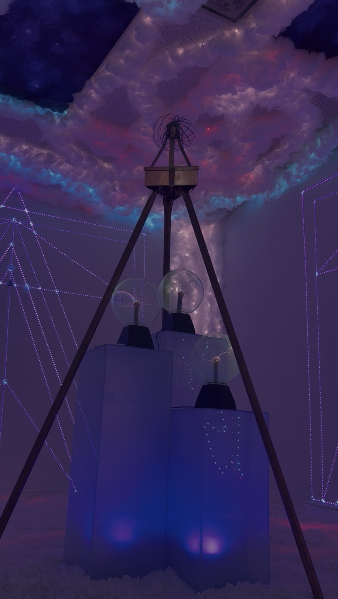 The Ionic Salt Cave: a glowing cloud ceiling, a salt floor and plasma spheres beneath a copper tripod